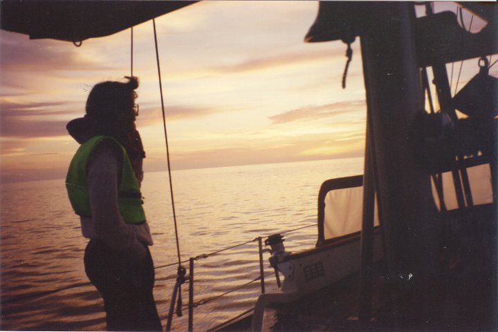 Janice out at sea sailing on Lachesa